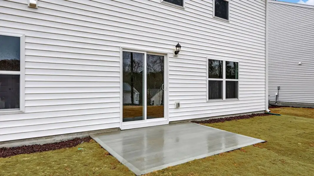 Exterior details and patio area of a home in Wilson's Ridge, Wilson's Mills (Image 2). Exterior details and patio area of a home in Wilson's Ridge, Wilson's Mills (Image 2).