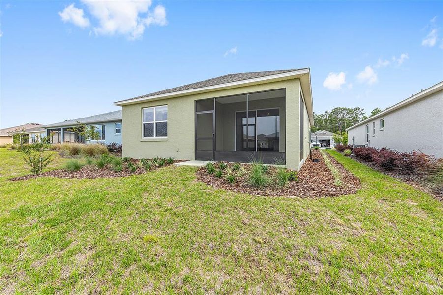 Exterior details and patio area of a home in On Top of the World Communities, Ocala (Image 8).