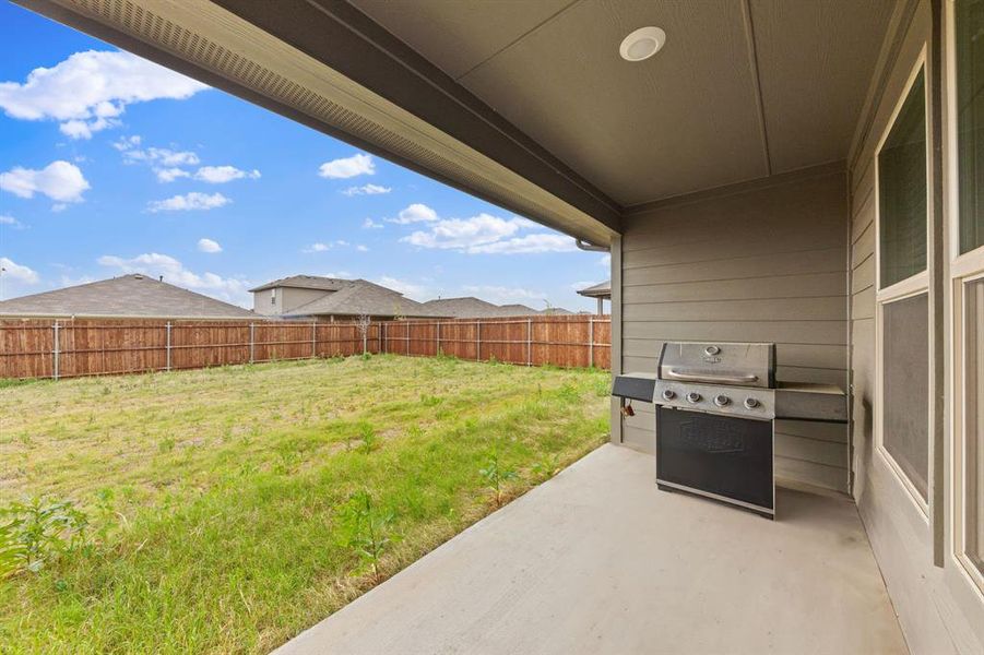 Exterior details and patio area of a home in Rosewood at Beltmill, Fort Worth (Image 22).