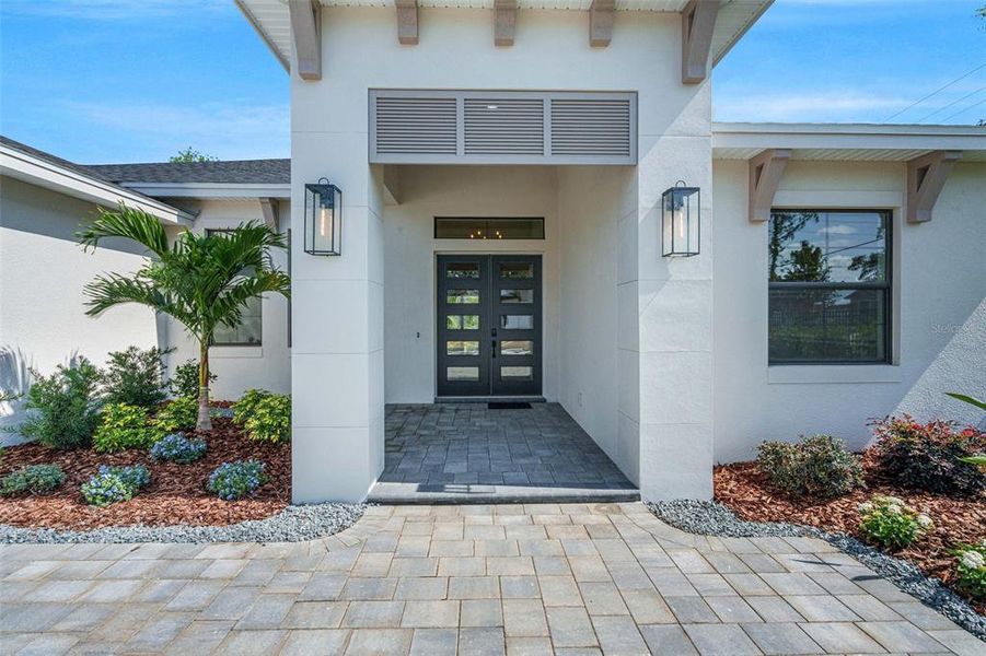 Front exterior of a new home in , Lakeland, FL, highlighting curb appeal (Image 1).