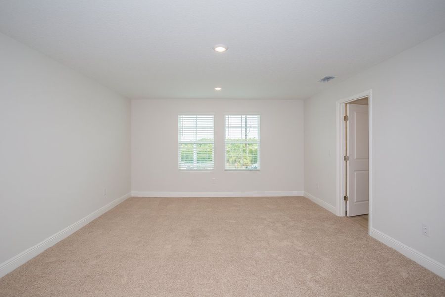 Representative unfurnished interior of a home built from the Anna Maria by Casa Fresca Homes in Mirada, San Antonio (Image 17).