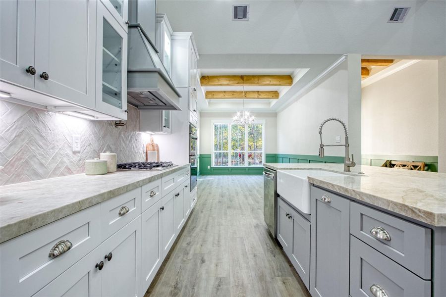 Farmhouse sink adds to the charm of the kitchen. Farmhouse sink adds to the charm of the kitchen.