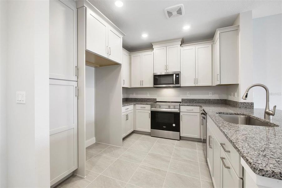 Furnished interior view inside a new home in Gatherings® of Lake Nona, Orlando (Image 8).