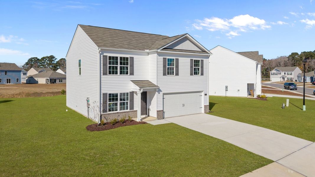 Front exterior of a new home in Madeline Farm, New Bern, NC, highlighting curb appeal (Image 15).