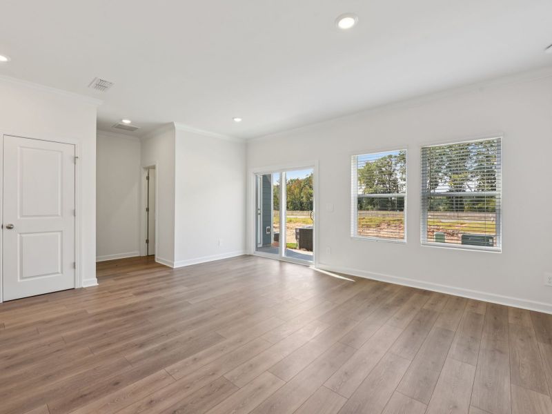 The great room offers an abundance of natural light. The great room offers an abundance of natural light.