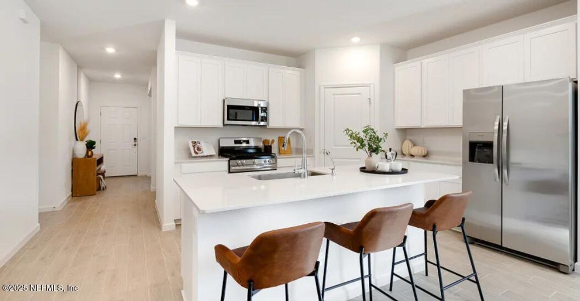 Furnished interior view inside a new home in Granary Park: Granary Park 50s, Green Cove Springs (Image 8). Furnished interior view inside a new home in Granary Park: Granary Park 50s, Green Cove Springs (Image 8).