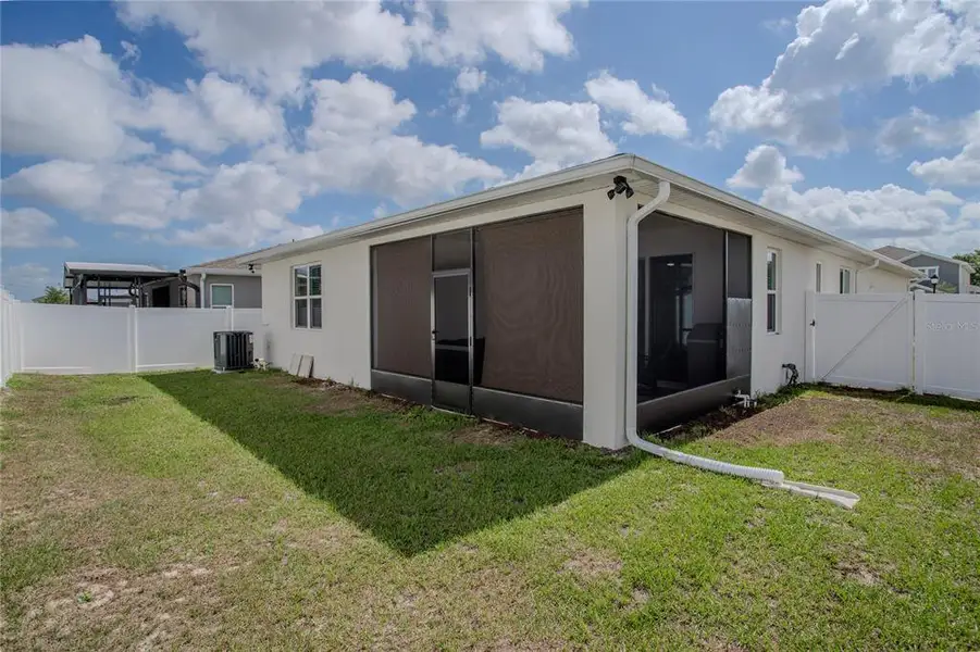 Exterior details and patio area of a home in , Winter Haven (Image 23).