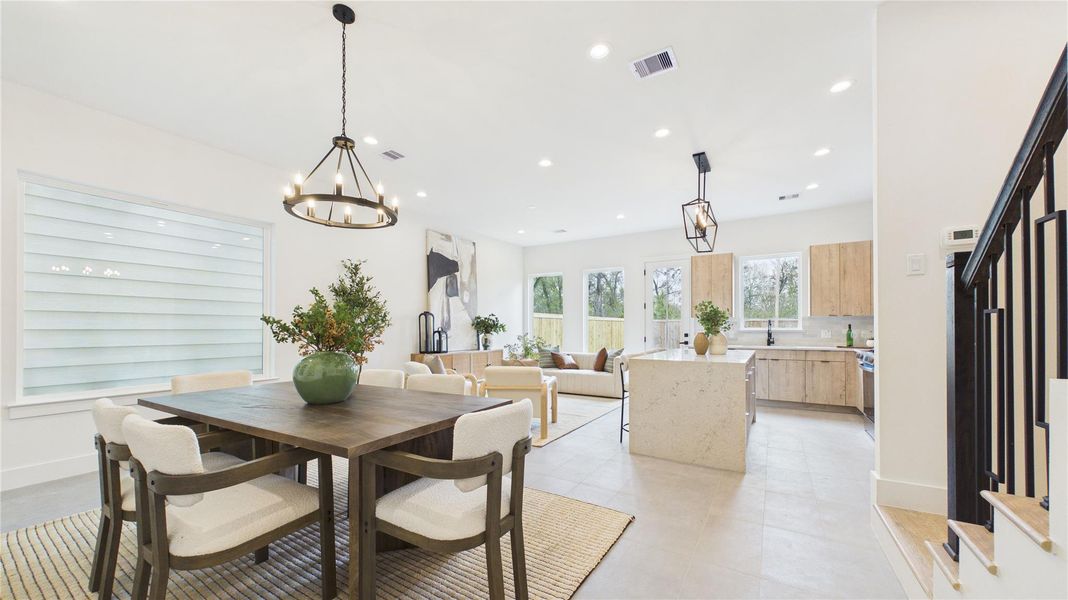 Enjoy an effortless flow between kitchen, living, and dining all on the FIRST level of your home!
