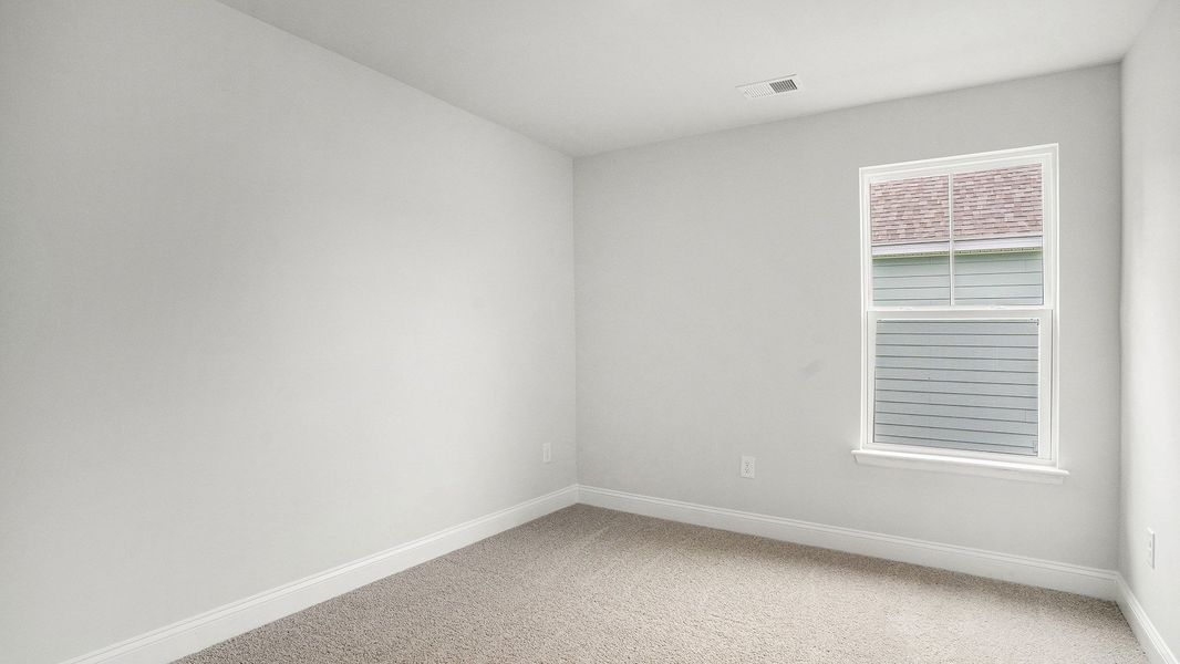 Spacious, unfurnished interior of a new home in The Preserve at Shaftesbury Glen, Conway (Image 9).