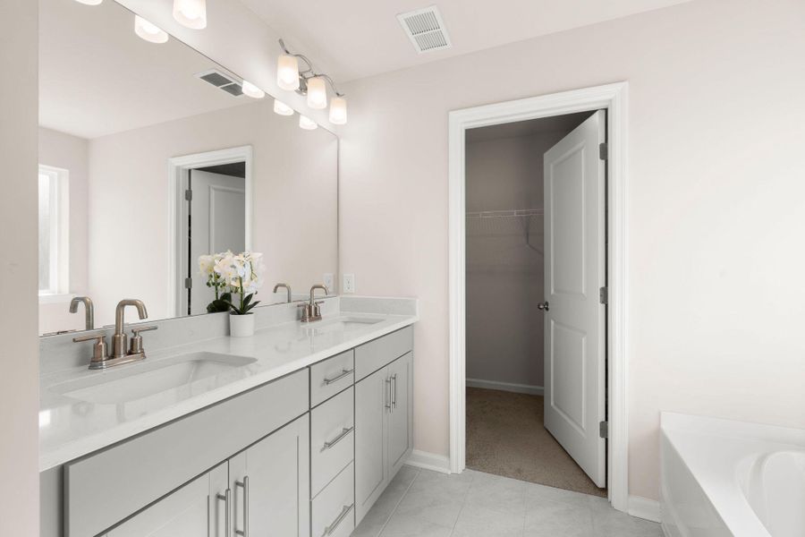 Furnished interior view inside a new home in Jasmine Point at Lakes of Cane Bay, Summerville (Image 29).
