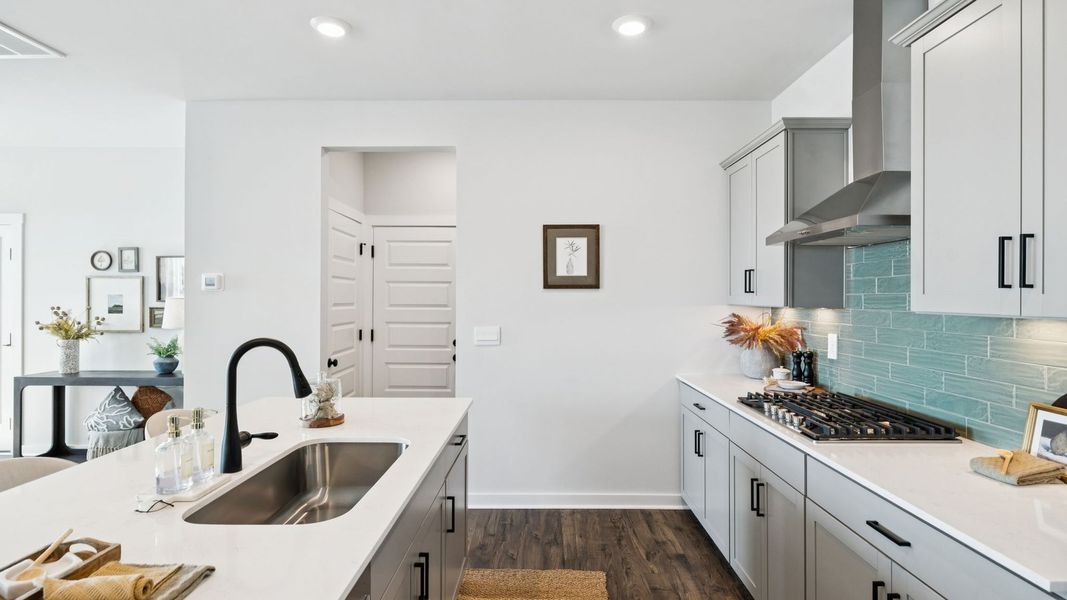 Representative furnished interior of a home built from the IRWIN A by D.R. Horton in Harvest Point, Spring Hill (Image 29).