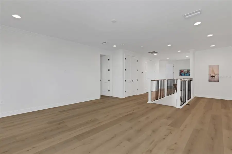 Spacious, unfurnished interior of a new home in Cassata Lakes, Nokomis (Image 62).