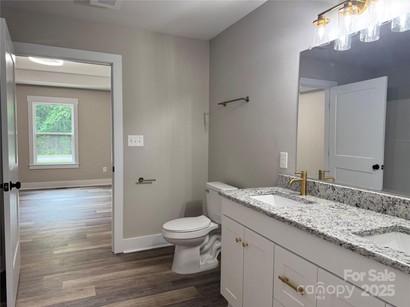 Primary En-Suite. Representative photos—finishes, colors, and materials may vary in the actual home. Professional photos of actual home coming soon.
