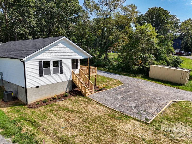 Front exterior of a new home in , Asheville, NC, highlighting curb appeal (Image 27).