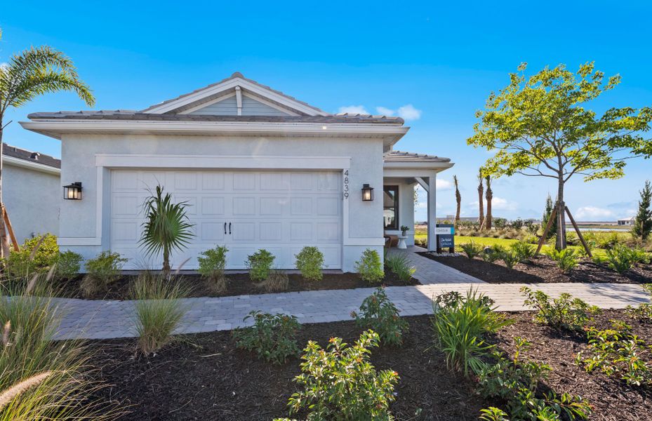 Representative exterior photo of a completed home built from the Contour by Del Webb in Del Webb Catalina, Lakewood Ranch, FL (Image 22).