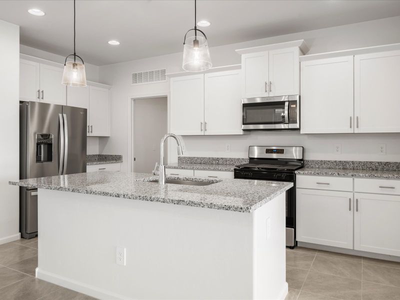 Front exterior of a new home in Mandarina - Signature Series, Marana, AZ, highlighting curb appeal (Image 1).