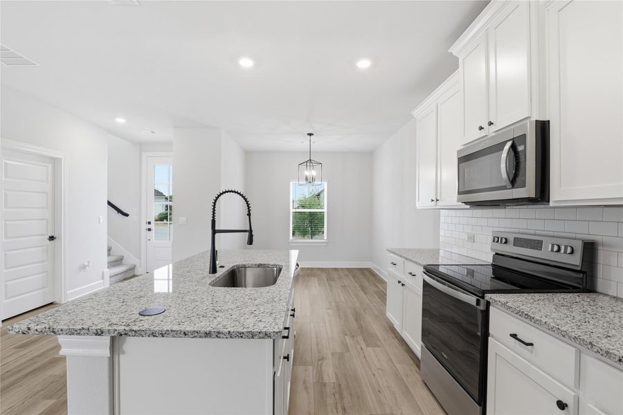 Furnished interior view inside a new home in Whisper Valley, Manor (Image 15).