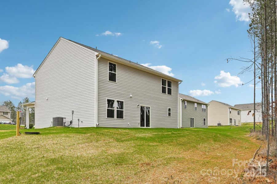 Exterior details and patio area of a home in The Pines at Stoney Point, Lexington (Image 10).