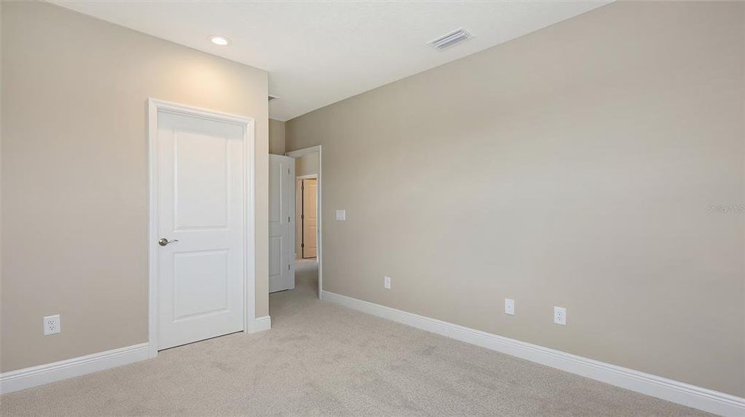 Spacious, unfurnished interior of a new home in Palm Grove, Lakewood Ranch (Image 32). Spacious, unfurnished interior of a new home in Palm Grove, Lakewood Ranch (Image 32).