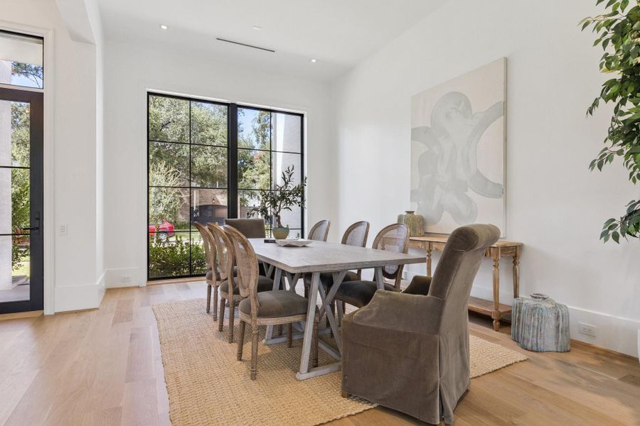 [Dining Room]This view reveals the opening to the en suite study (or bedroom) at top left.