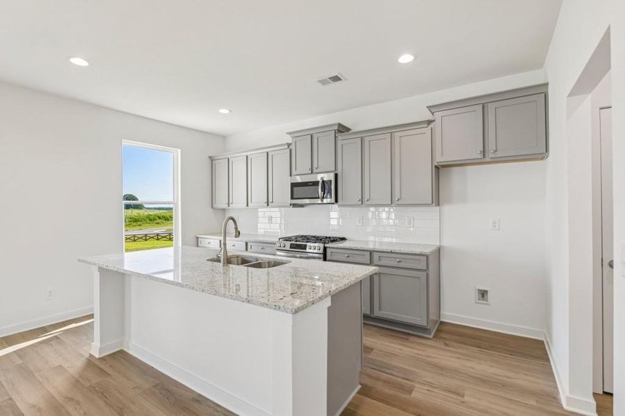 Furnished interior view inside a new home in Sutton’s Landing, Statham (Image 15).