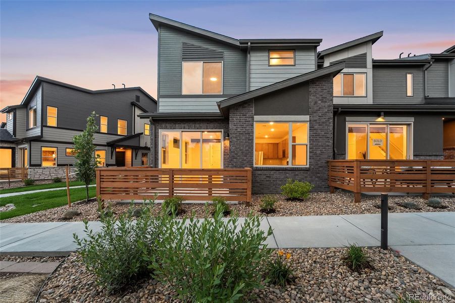 Front exterior of a new home in , Arvada, CO, highlighting curb appeal (Image 22).
