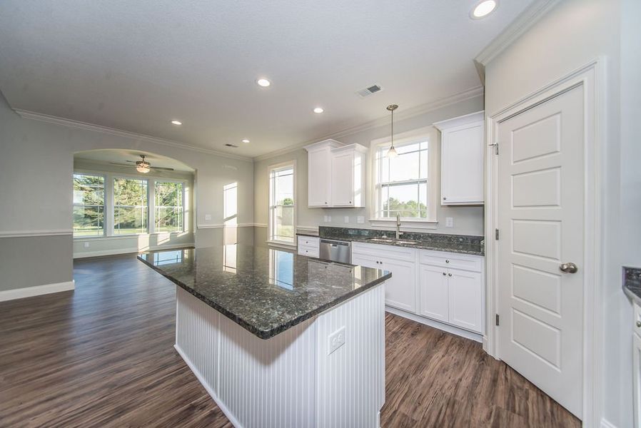 Representative furnished interior of a home built from the Mediterranean by Enchanted Homes in Lonesome Dove, San Antonio (Image 12).