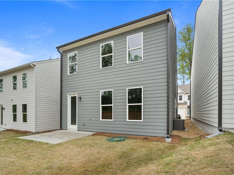 Exterior details and patio area of a home in The Village at Shallowford, Kennesaw (Image 20).