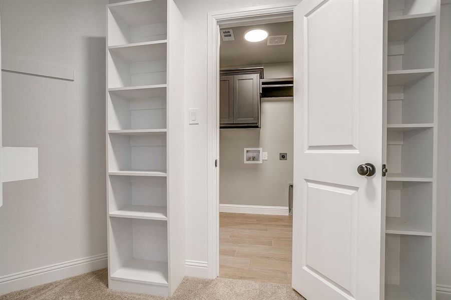 opens to laundry room!