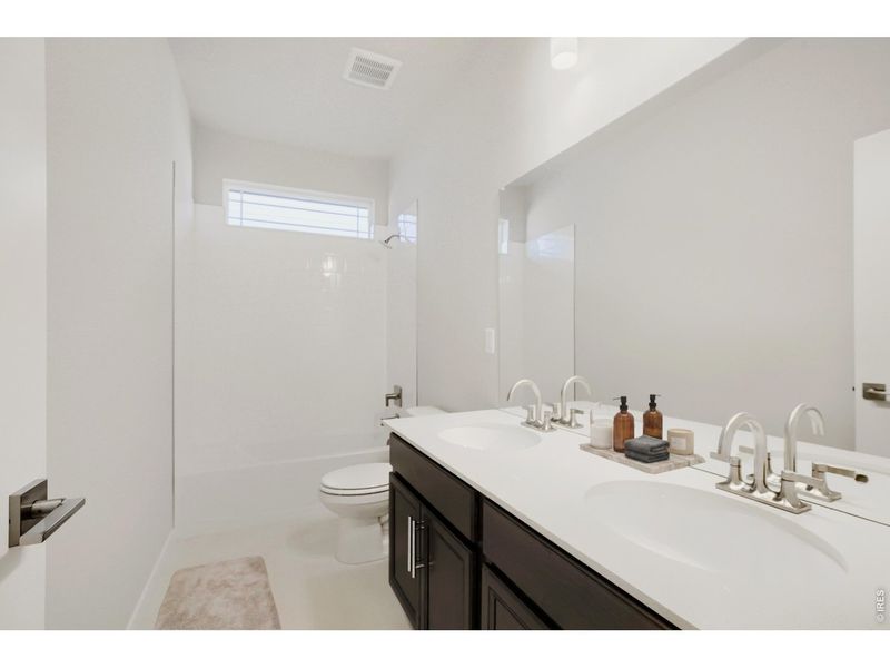 Furnished interior view inside a new home in Farmstead, Berthoud (Image 30).