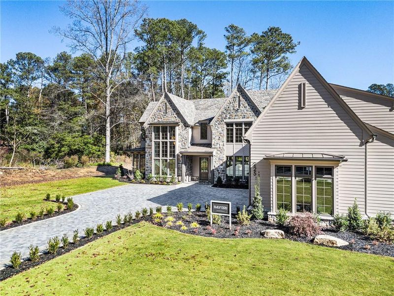 Front exterior of a new home in , Roswell, GA, highlighting curb appeal (Image 29). Front exterior of a new home in , Roswell, GA, highlighting curb appeal (Image 29).
