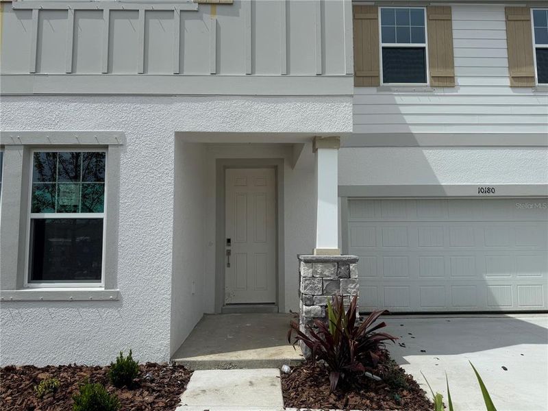 Exterior details and patio area of a home in Oakfield Trails Traditional, Parrish (Image 3). Exterior details and patio area of a home in Oakfield Trails Traditional, Parrish (Image 3).