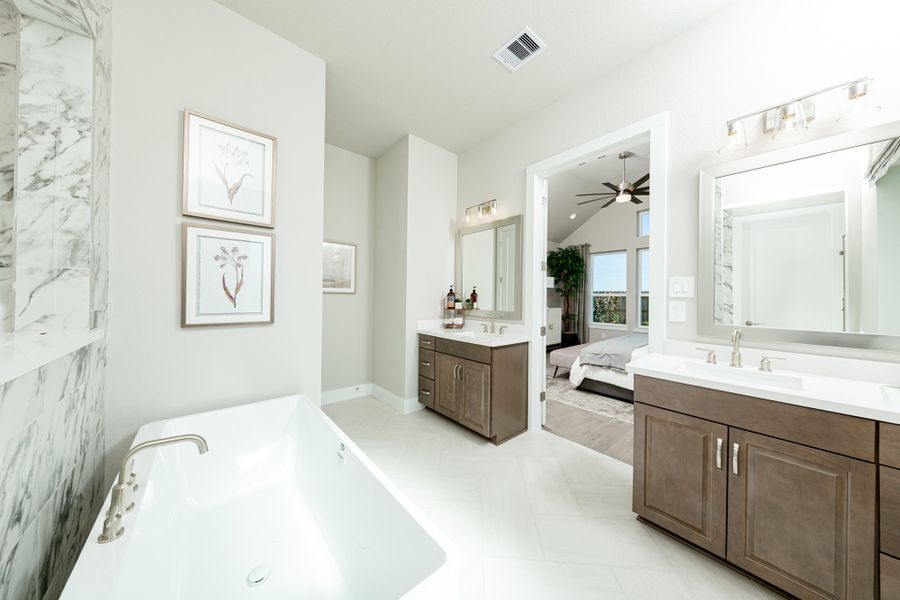 Representative furnished interior of a home built from the Mckinney by Beazer Homes in Ellwood, Iowa Colony (Image 11).
