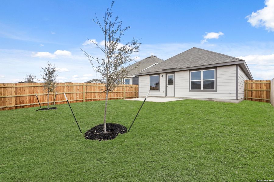 Exterior details and patio area of a home in Abbott Place, St. Hedwig (Image 16).