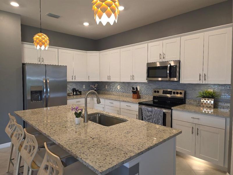 Furnished interior view inside a new home in , Port Charlotte (Image 23).