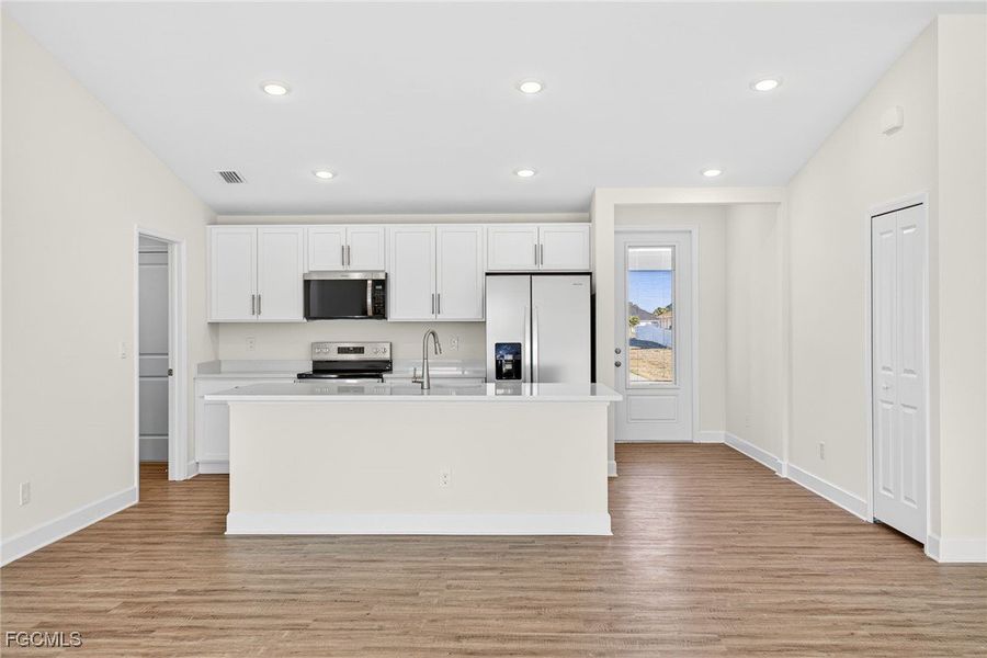 Furnished interior view inside a new home in Cape Coral, Cape Coral (Image 8). Furnished interior view inside a new home in Cape Coral, Cape Coral (Image 8).