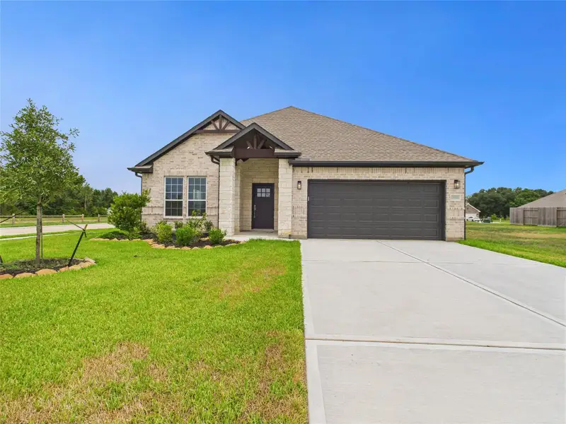 Front exterior of a new home in , Santa Fe, TX, highlighting curb appeal (Image 17). Front exterior of a new home in , Santa Fe, TX, highlighting curb appeal (Image 17).
