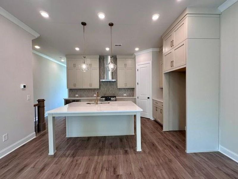 Furnished interior view inside a new home in Ward's Crossing Townhomes, Johns Creek (Image 7).