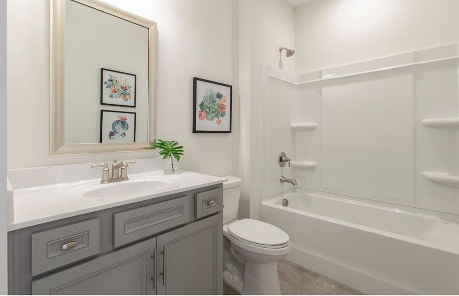 First floor Bedroom Suite Bath with a spa-like soaking tub for relaxation.