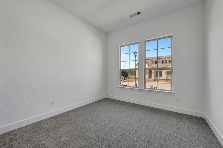 Spacious, unfurnished interior of a new home in Wellington, Haslet (Image 29).