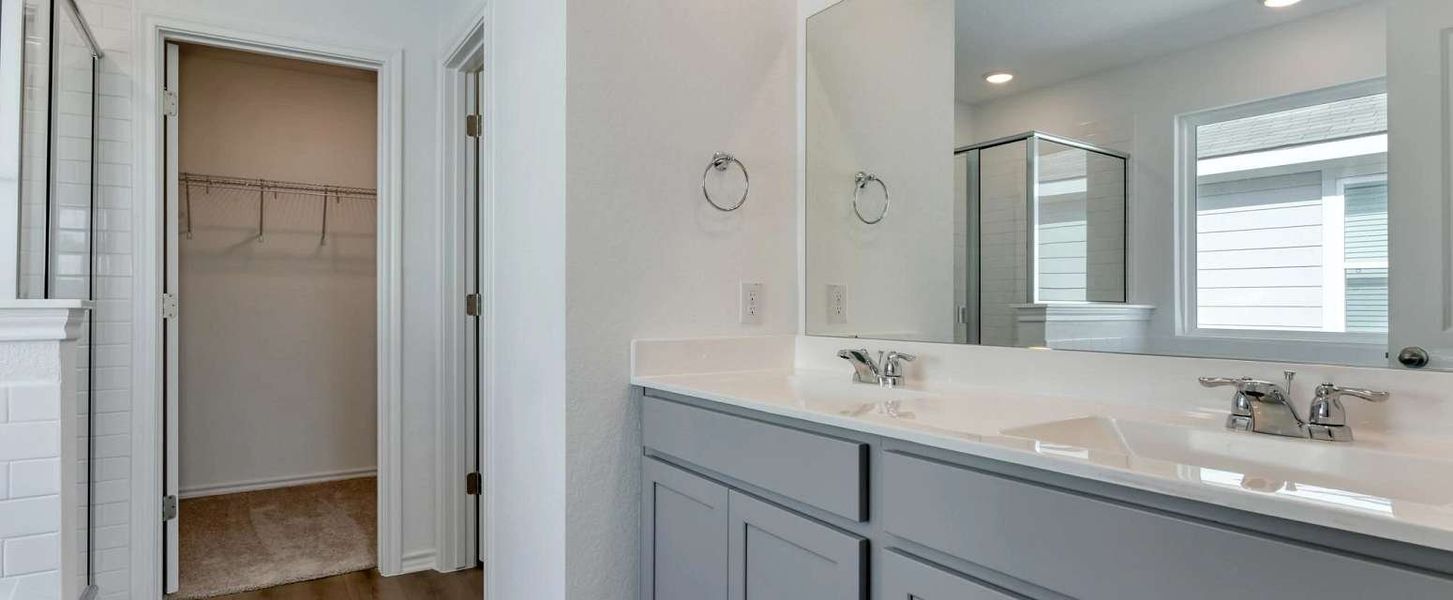 Representative furnished interior of a home built from the Dunlap by Ashton Woods in Meadows at Hennersby Hollow 40's, San Antonio (Image 9).