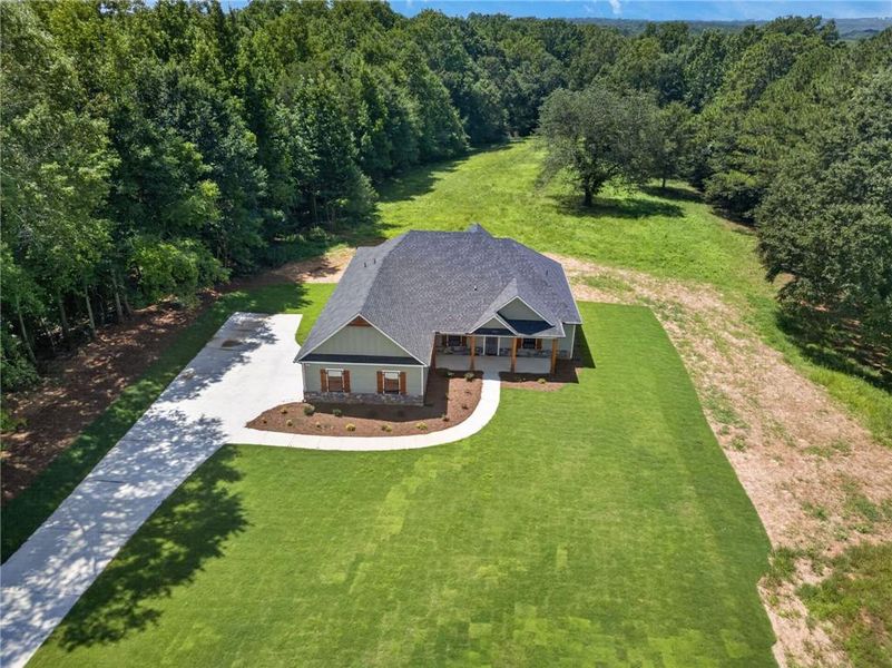Front exterior of a new home in , Waco, GA, highlighting curb appeal (Image 19).
