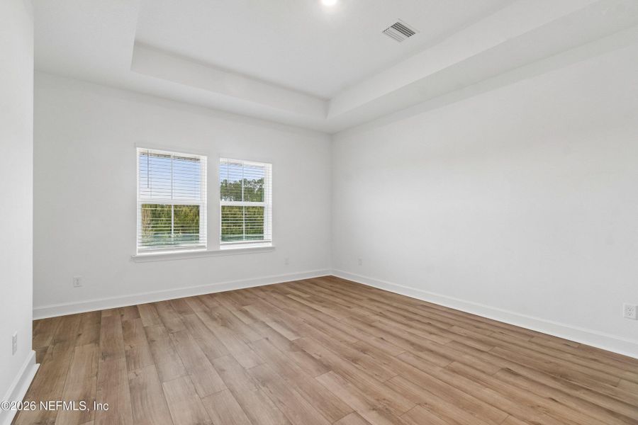 Spacious, unfurnished interior of a new home in Westerly Park at Wildlight - Courtyard Collection, Yulee (Image 22).