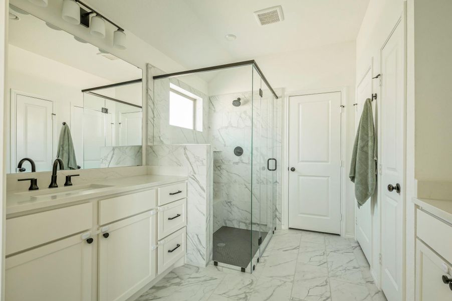 Primary Bathroom with Glass Surround Shower