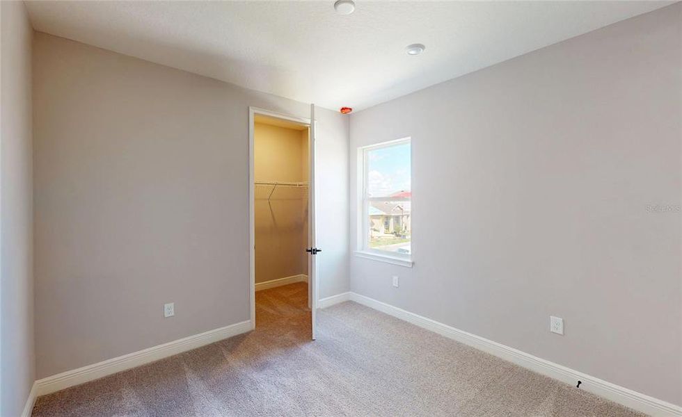 Spacious, unfurnished interior of a new home in Laureate Park, Orlando (Image 16).