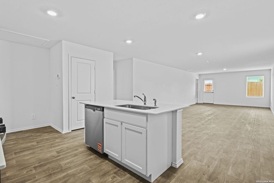 Furnished interior view inside a new home in Avenida, Converse (Image 7).