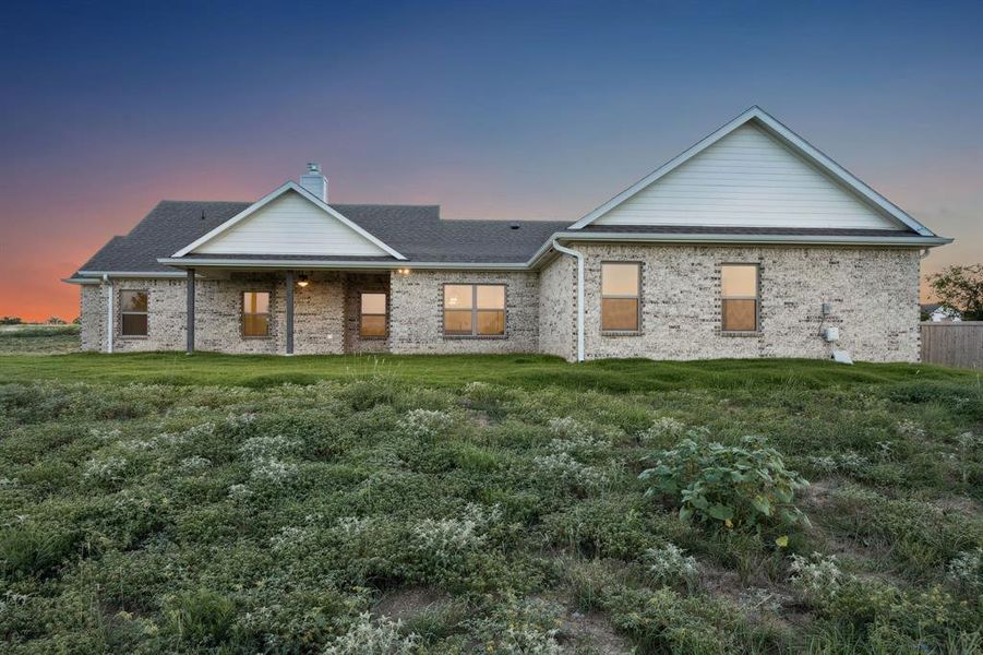 Front exterior of a new home in The Reserve At Brock, Weatherford, TX, highlighting curb appeal (Image 20).