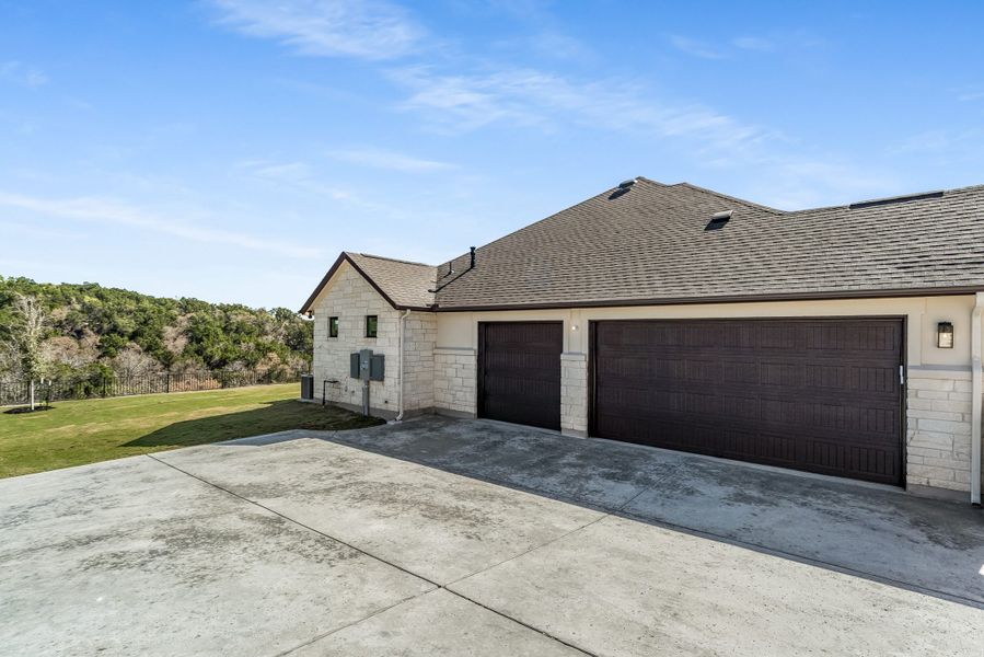 Representative exterior photo of a completed home built from the Coronado I by Giddens Homes in Clearwater Ranch, Liberty Hill, TX (Image 41).