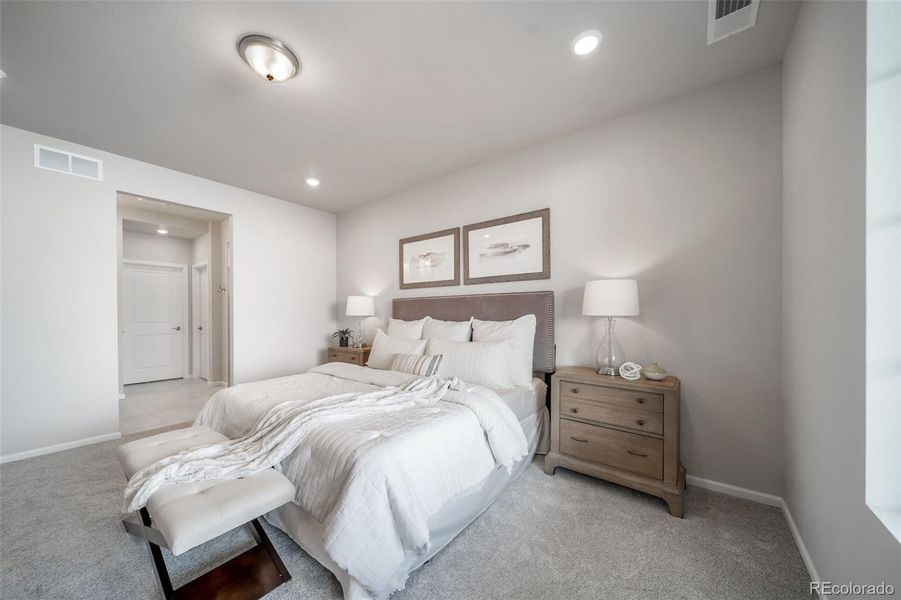 Furnished interior view inside a new home in The Reserve, Aurora (Image 8).