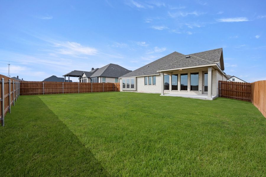 Exterior details and patio area of a home in Chapel Ridge, Waco (Image 24).